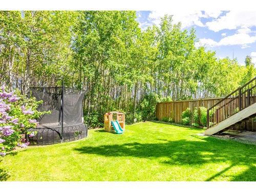 94 Aspen Hills Way Sw, Calgary, AB - Outdoor With Backyard