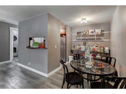 219-525 56 Avenue Sw, Calgary, AB - Indoor Photo Showing Dining Room