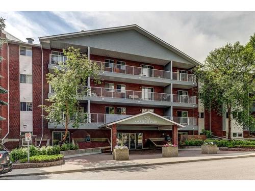 219-525 56 Avenue Sw, Calgary, AB - Outdoor With Facade