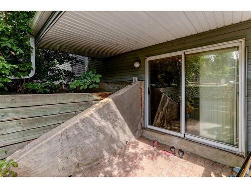 219-525 56 Avenue Sw, Calgary, AB - Outdoor With Deck Patio Veranda With Exterior