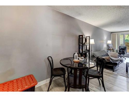 219-525 56 Avenue Sw, Calgary, AB - Indoor Photo Showing Dining Room