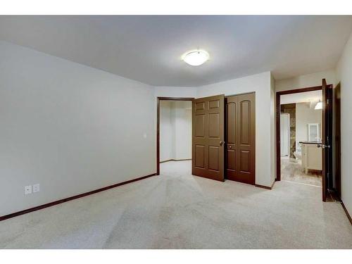 140 Cranwell Crescent Se, Calgary, AB - Indoor Photo Showing Bedroom