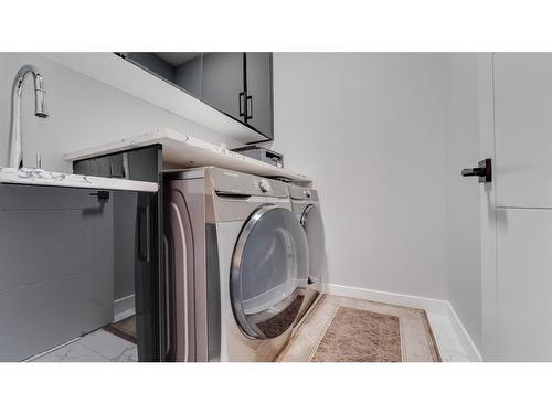 72 Saddlepeace Way Ne, Calgary, AB - Indoor Photo Showing Laundry Room