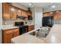 95 Kincora Glen Green Nw, Calgary, AB  - Indoor Photo Showing Kitchen With Double Sink 