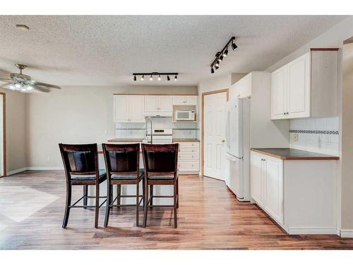 115 Mt Apex Crescent Se, Calgary, AB - Indoor Photo Showing Kitchen