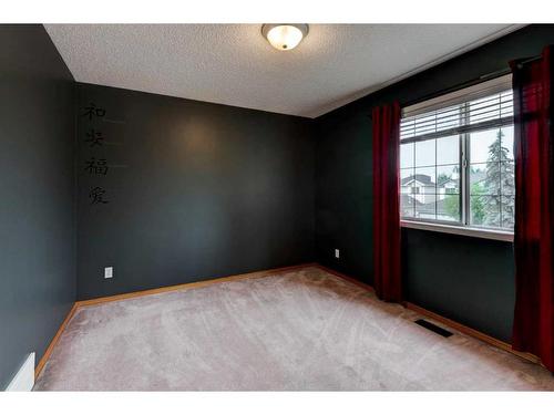 115 Mt Apex Crescent Se, Calgary, AB - Indoor Photo Showing Other Room