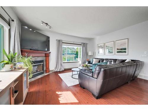 90 Rockyspring Circle Nw, Calgary, AB - Indoor Photo Showing Living Room With Fireplace