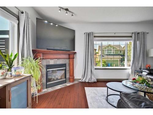 90 Rockyspring Circle Nw, Calgary, AB - Indoor Photo Showing Living Room With Fireplace