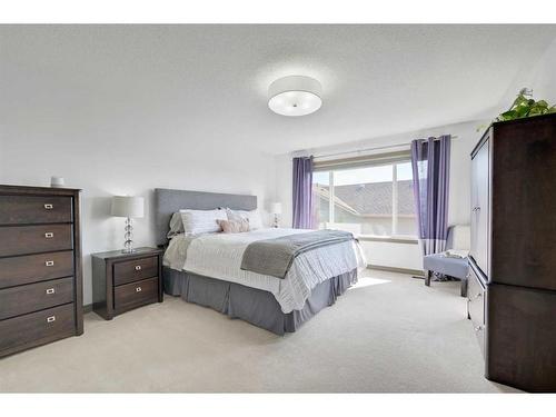 90 Rockyspring Circle Nw, Calgary, AB - Indoor Photo Showing Bedroom