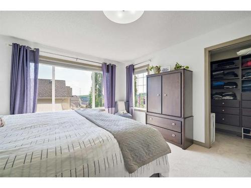 90 Rockyspring Circle Nw, Calgary, AB - Indoor Photo Showing Bedroom