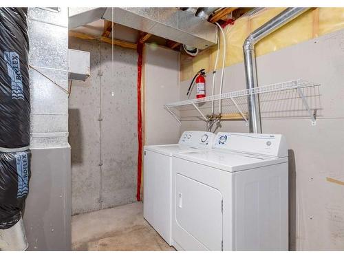 18 Cranwell Common Se, Calgary, AB - Indoor Photo Showing Laundry Room