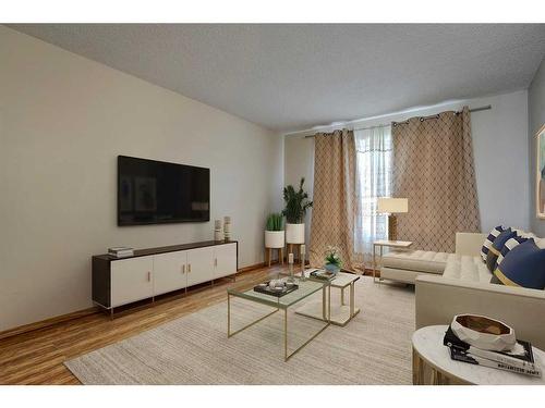 80 Everridge Way Sw, Calgary, AB - Indoor Photo Showing Living Room