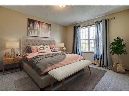 80 Everridge Way Sw, Calgary, AB - Indoor Photo Showing Bedroom