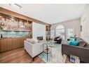 1906 12 Street Sw, Calgary, AB  - Indoor Photo Showing Living Room With Fireplace 