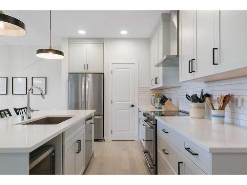 55 Shawnee Heath Sw, Calgary, AB - Indoor Photo Showing Kitchen With Stainless Steel Kitchen With Upgraded Kitchen