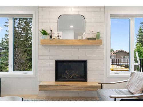 55 Shawnee Heath Sw, Calgary, AB - Indoor Photo Showing Living Room With Fireplace