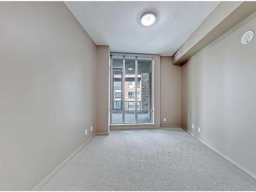 202-1410 1 Street Se, Calgary, AB - Indoor Photo Showing Other Room