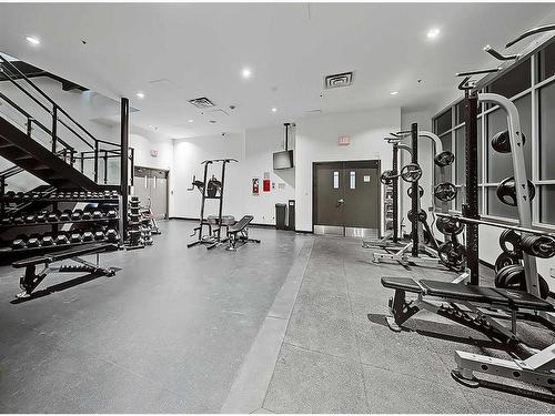 202-1410 1 Street Se, Calgary, AB - Indoor Photo Showing Gym Room