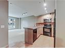 202-1410 1 Street Se, Calgary, AB  - Indoor Photo Showing Kitchen 