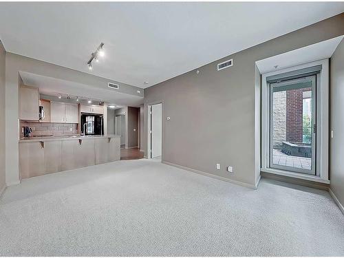 202-1410 1 Street Se, Calgary, AB - Indoor Photo Showing Other Room