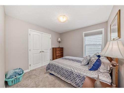 54 Masters Mews Se, Calgary, AB - Indoor Photo Showing Bedroom