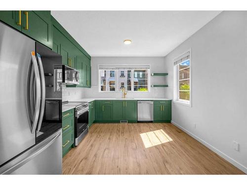 48 Walden Walk Se, Calgary, AB - Indoor Photo Showing Kitchen With Stainless Steel Kitchen