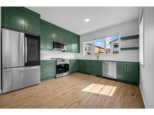 48 Walden Walk Se, Calgary, AB - Indoor Photo Showing Kitchen With Stainless Steel Kitchen