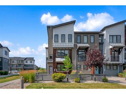 48 Walden Walk Se, Calgary, AB - Outdoor With Balcony With Facade