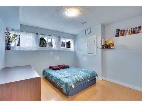 62 Taracove Estate Drive Ne, Calgary, AB - Indoor Photo Showing Bedroom