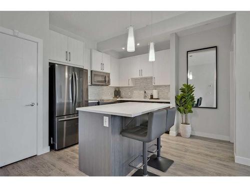 107-16 Sage Hill Terrace, Calgary, AB - Indoor Photo Showing Kitchen With Stainless Steel Kitchen With Upgraded Kitchen