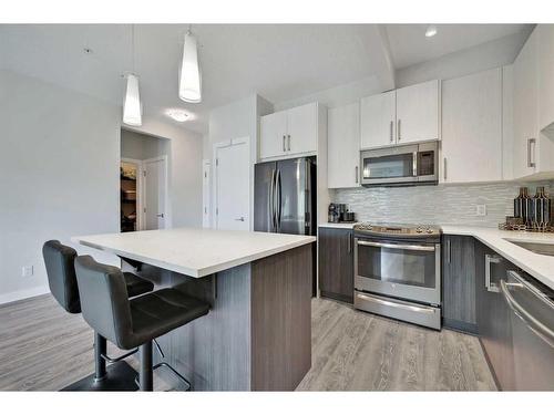 107-16 Sage Hill Terrace, Calgary, AB - Indoor Photo Showing Kitchen With Stainless Steel Kitchen With Upgraded Kitchen