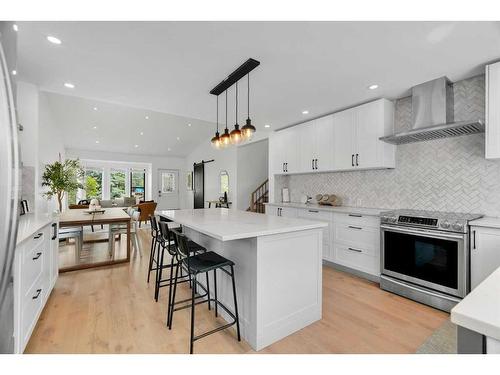 52 Woodstock Way Sw, Calgary, AB - Indoor Photo Showing Kitchen With Upgraded Kitchen