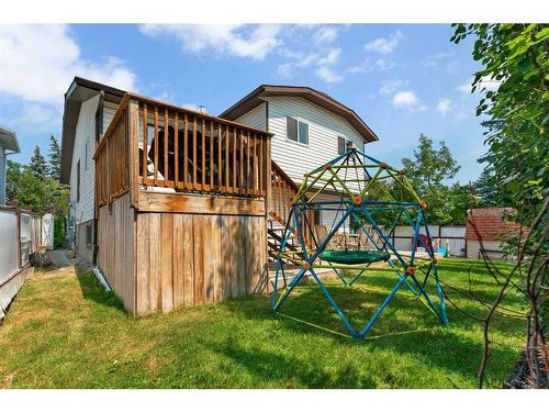 52 Woodstock Way Sw, Calgary, AB - Outdoor With Exterior