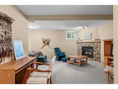 1077 Wilson Way, Canmore, AB - Indoor With Fireplace