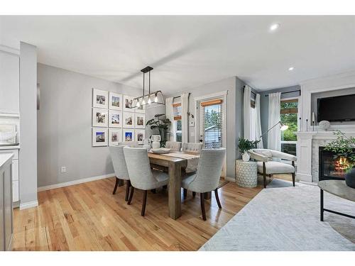 504 22 Avenue Nw, Calgary, AB - Indoor Photo Showing Dining Room With Fireplace