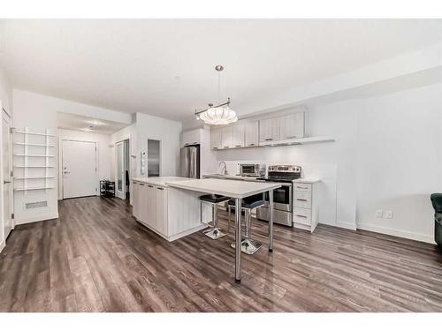 208-730 5 Street Ne, Calgary, AB - Indoor Photo Showing Kitchen With Upgraded Kitchen