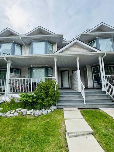 78 Martin Crossing Court Ne, Calgary, AB - Outdoor With Deck Patio Veranda With Facade