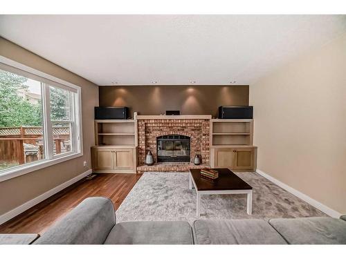 160 Sandringham Close Nw, Calgary, AB - Indoor Photo Showing Living Room With Fireplace