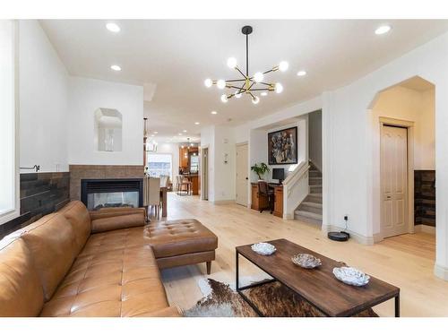 2431 24A Street Sw, Calgary, AB - Indoor Photo Showing Living Room With Fireplace