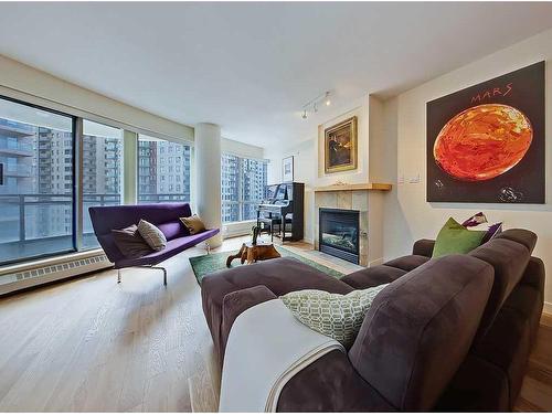 904-1088 6 Avenue Sw, Calgary, AB - Indoor Photo Showing Living Room With Fireplace