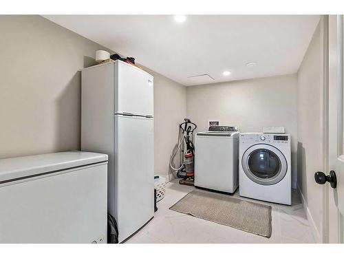 144003 370 Avenue West, Rural Foothills County, AB - Indoor Photo Showing Laundry Room