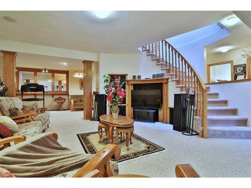 8 Hamptons Rise Nw, Calgary, AB - Indoor With Fireplace