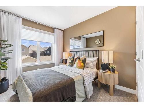 63 Heirloom Boulevard Se, Calgary, AB - Indoor Photo Showing Bedroom