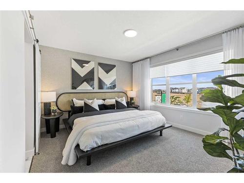 63 Heirloom Boulevard Se, Calgary, AB - Indoor Photo Showing Bedroom