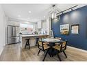 63 Heirloom Boulevard Se, Calgary, AB  - Indoor Photo Showing Dining Room 