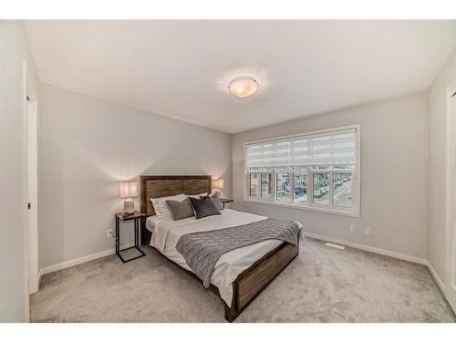 230 Aquila Drive Nw, Calgary, AB - Indoor Photo Showing Bedroom