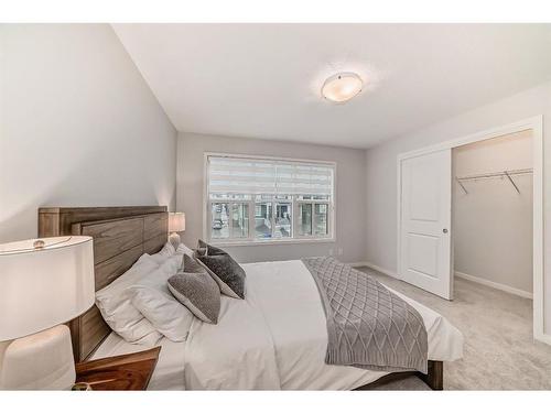 230 Aquila Drive Nw, Calgary, AB - Indoor Photo Showing Bedroom