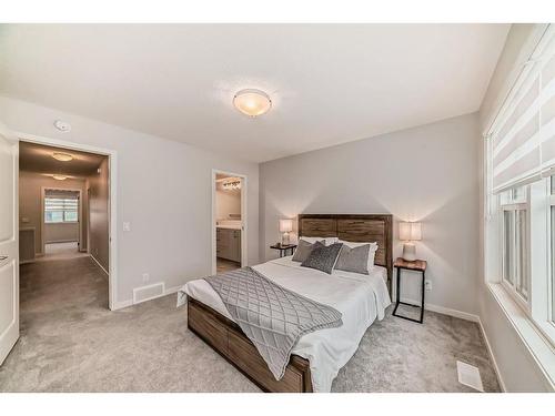 230 Aquila Drive Nw, Calgary, AB - Indoor Photo Showing Bedroom