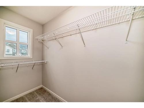 230 Aquila Drive Nw, Calgary, AB - Indoor With Storage