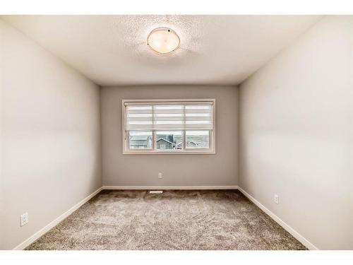 230 Aquila Drive Nw, Calgary, AB - Indoor Photo Showing Other Room